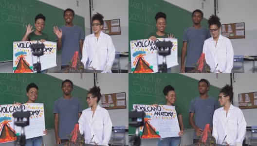 学生在教室里做一个关于火山的在线演示高清在线视频素材下载