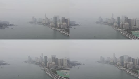 雾霾天气下的海滨城市航拍图高清在线视频素材下载