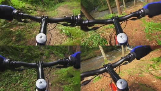 山地自行车穿过绿色森林POV高清在线视频素材下载