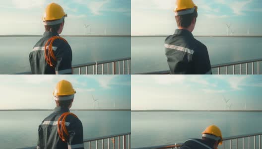日落时分戴着防护头盔的男性工程师。高清在线视频素材下载