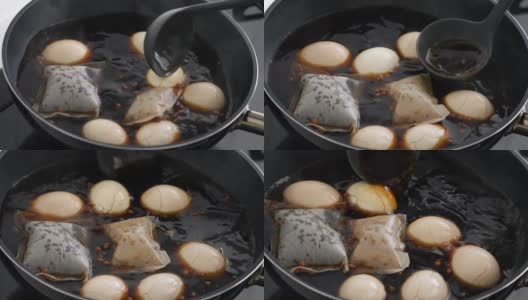 在家烹饪传统的台湾食物茶叶蛋。高清在线视频素材下载