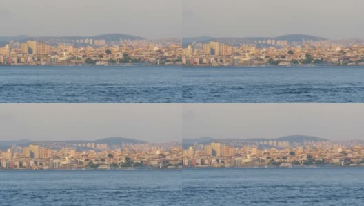 土耳其，伊斯坦布尔，从马尔马拉海看到的城市海岸，货船和其他船只在上面航行高清在线视频素材下载