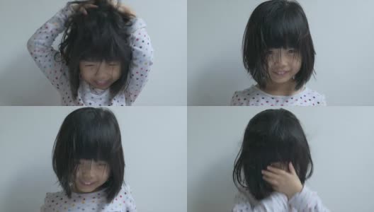 一个中国小女孩做鬼脸的特写高清在线视频素材下载