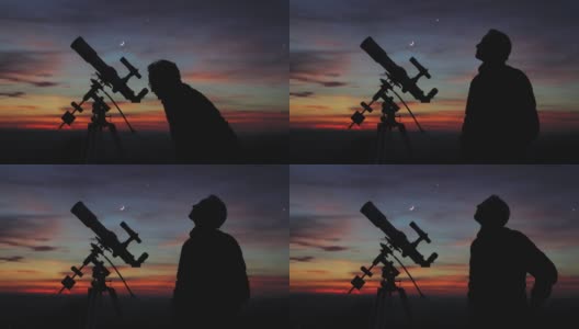 一个人的剪影，望远镜和星空下的乡村高清在线视频素材下载