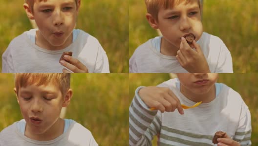 男孩在户外吃烤串高清在线视频素材下载