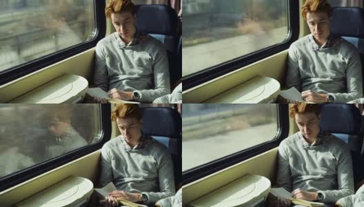 火车上的人在看书高清在线视频素材下载