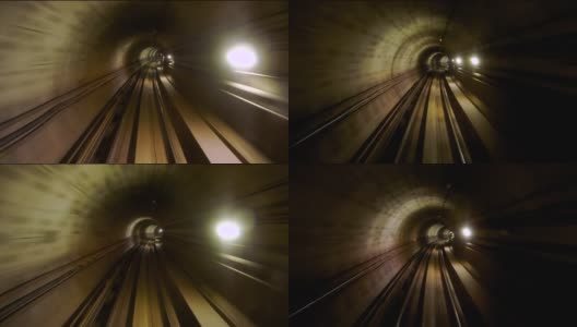 从行驶中的列车后窗看到的地铁隧道。快速的地铁从现代化的地铁站开出高清在线视频素材下载