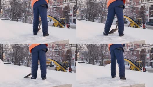 工人们在冬天清扫道路上的积雪，清扫道路上的积雪高清在线视频素材下载