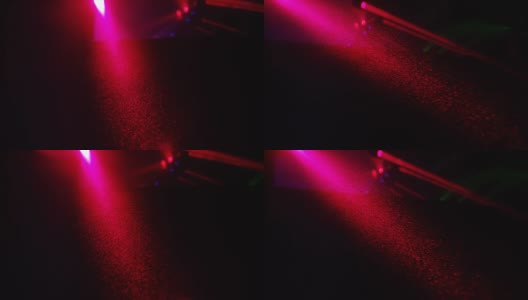 胡里节的微距镜头，一名DJ在慢镜头中为胡里节派对上色，粉尘漂浮在空中高清在线视频素材下载