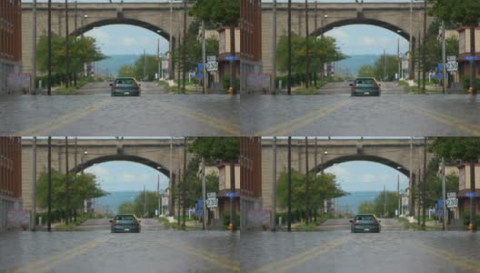 被水淹没的车在拱门下-宽镜头高清在线视频素材下载
