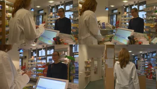 药剂师从商店里的女人那里拿处方高清在线视频素材下载