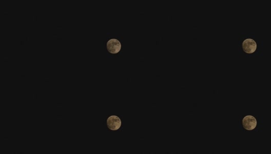 在黑暗的夜空下，令人惊叹的满月景象高清在线视频素材下载