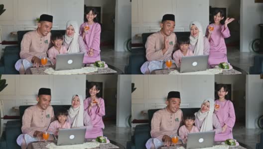 马来西亚穆斯林家庭在客厅挥舞视频电话亲戚高清在线视频素材下载