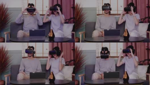 亚洲夫妇戴着现代虚拟现实眼镜坐在家里的客厅里看电影。节日活动家庭娱乐技术。幸福生活在一起。metaverse概念高清在线视频素材下载