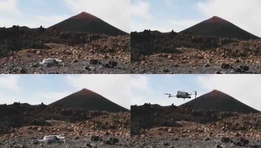 一架无人机正在Chinyero火山附近的黑色熔岩上起飞高清在线视频素材下载