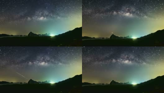星星和银河在深夜升起，那是滑滑的云。在美丽的山形，泰国的Samet Nang She攀牙高清在线视频素材下载