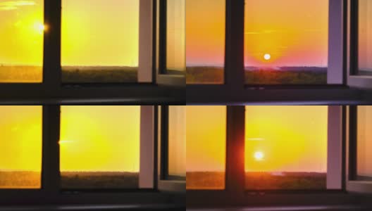 天空中的夕阳透过窗户的剪影，时间的流逝高清在线视频素材下载