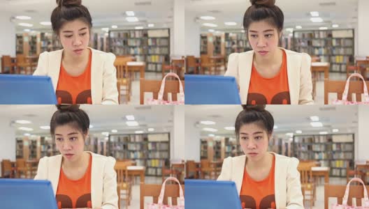 女性使用笔记本电脑高清在线视频素材下载