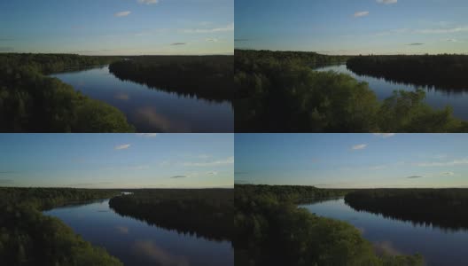 空中自然景观在日落时飞过河流高清在线视频素材下载