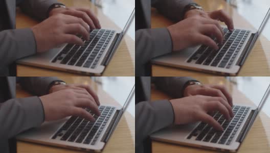 男性的手在键盘上输入文字高清在线视频素材下载