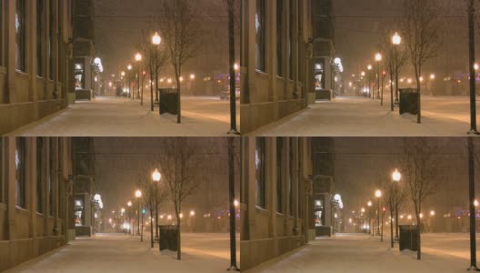 圣诞节期间冬天的天气。暴风雪，雪花，雪花，雪花。城市场景。高清在线视频素材下载