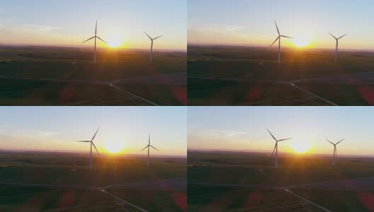 近距离风力涡轮机和农田在日落4K高清在线视频素材下载