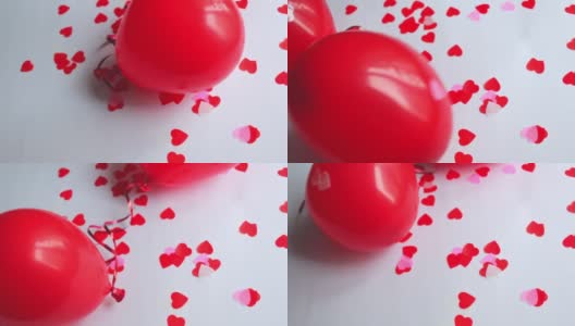 白色背景上心形的红色气球高清在线视频素材下载