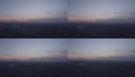 日落时分雅加达城郊美丽鸟瞰图的视频片段。4K分辨率专业拍摄高清在线视频素材下载