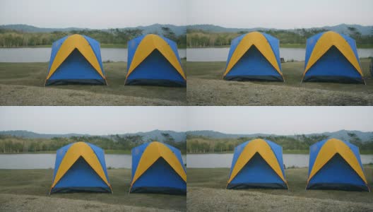 淘金:两个帐篷在多云的天空高清在线视频素材下载