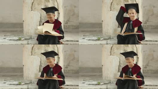 带着一本书的男孩毕业了高清在线视频素材下载