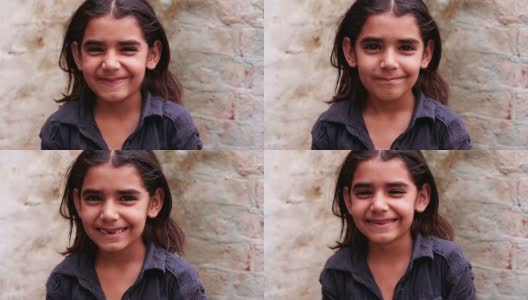 小女孩微笑的肖像高清在线视频素材下载