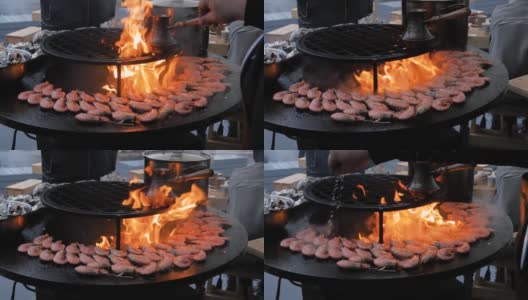 慢镜头:厨师用火苗在火盆上烤鲜红王虾高清在线视频素材下载