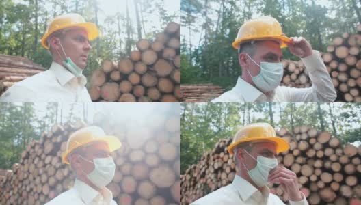 商人控制着木材装车队。佩戴口罩的检疫规定高清在线视频素材下载