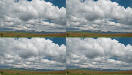 山峰上的田野和乌云。间隔拍摄FullHD高清在线视频素材下载