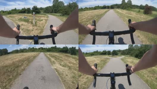 骑着自行车到达岔路口时的视角高清在线视频素材下载