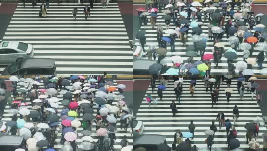东京新宿商务区，日本人挤在新宿JR车站大楼之间的街道上的4K镜头高清在线视频素材下载