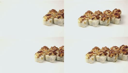 白色背景上的寿司卷。高清在线视频素材下载