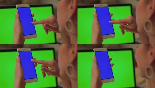 女孩用蓝屏的手机进行视频通话高清在线视频素材下载