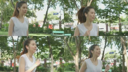 年轻迷人的女人听音乐耳机，在绿色城市公园跑步。健身跑步运动的人与健康的生活理念。高清在线视频素材下载