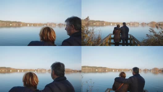 一对老年夫妇凝视着码头旁边的湖水高清在线视频素材下载