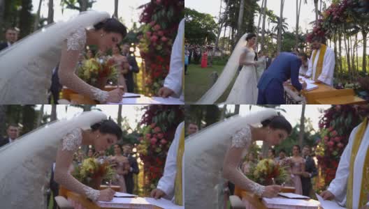 新娘在婚礼书上签名高清在线视频素材下载