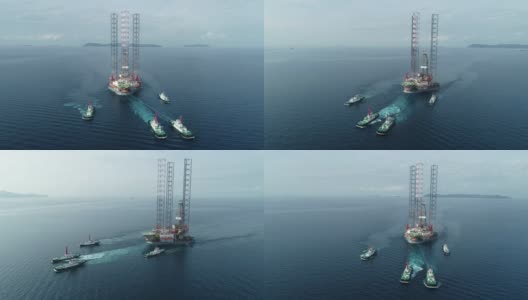 航拍俯视图拖船拖油船从炼油厂桥上海上运输高清在线视频素材下载