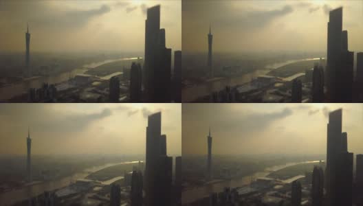 广州市景日落时间CTF大楼广州塔河航拍全景倾斜4k中国高清在线视频素材下载
