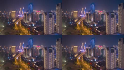 夜光飞行在青岛城市中心交通街道道路空中延时全景4k中国高清在线视频素材下载