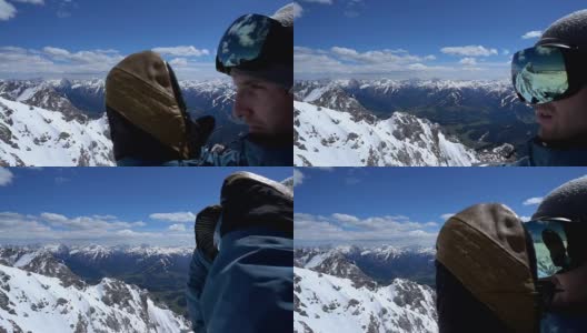 SLO MO滑雪板运动员戴着他的滑雪镜高清在线视频素材下载