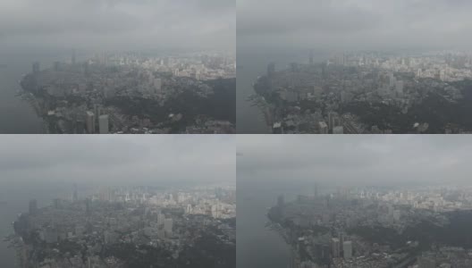 在雨季从高海拔俯瞰海滨城市高清在线视频素材下载