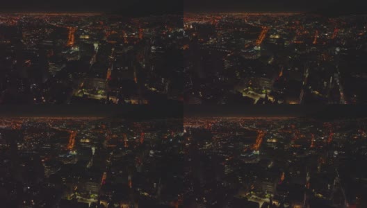 夜城的空中全景拍摄。在市区的建筑物上飞行。南非开普敦高清在线视频素材下载