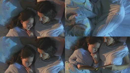 HD CRANE:母亲读睡前故事高清在线视频素材下载