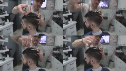 一个年轻人在理发店理发高清在线视频素材下载
