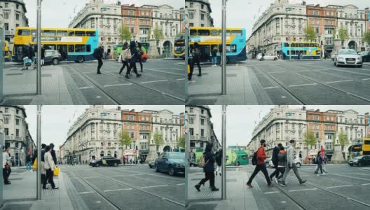都柏林市中心有行人和都柏林公交车高清在线视频素材下载